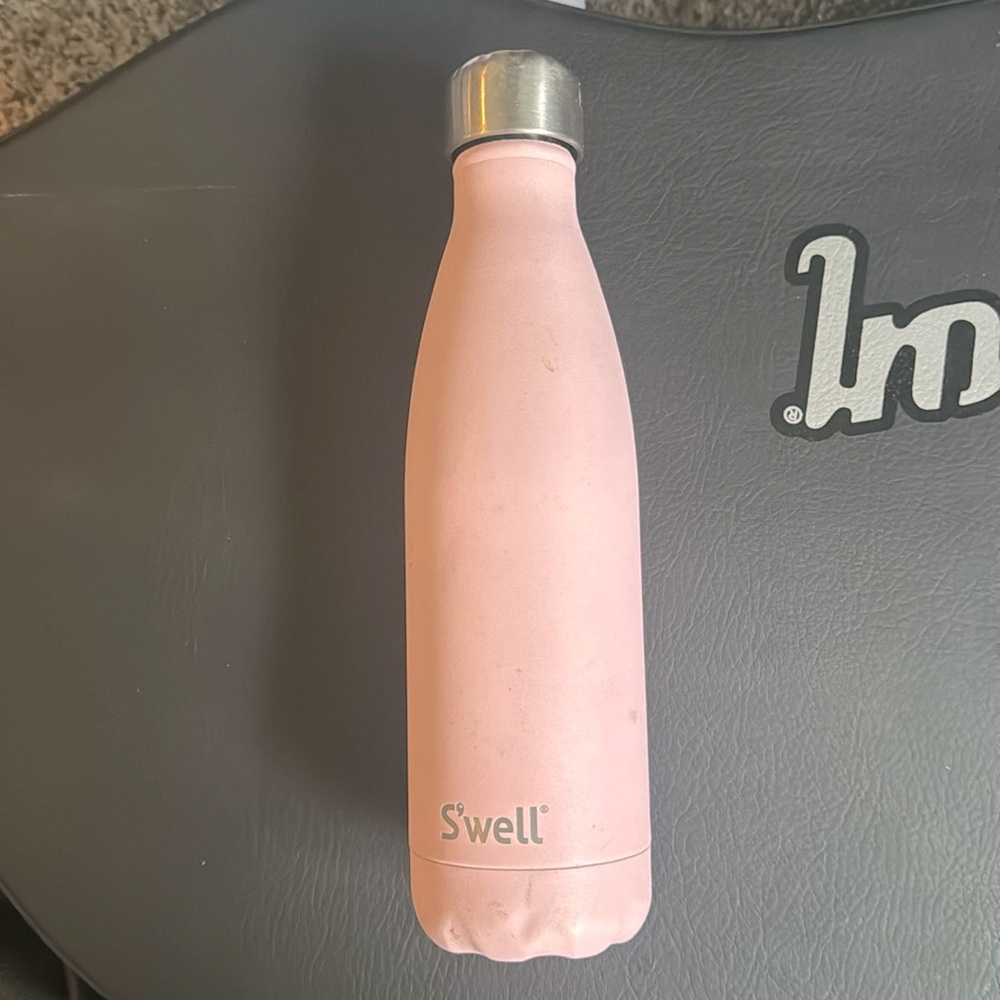 Used stainless pink Swell water bottle